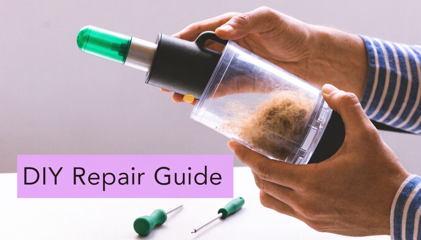 A person disassembling a handheld vacuum cleaner filled with pet hair for a DIY repair guide.